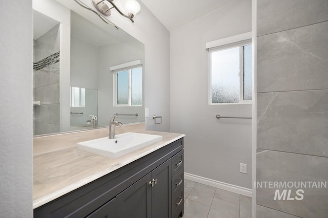 bathroom featuring tile patterned floors and vanity