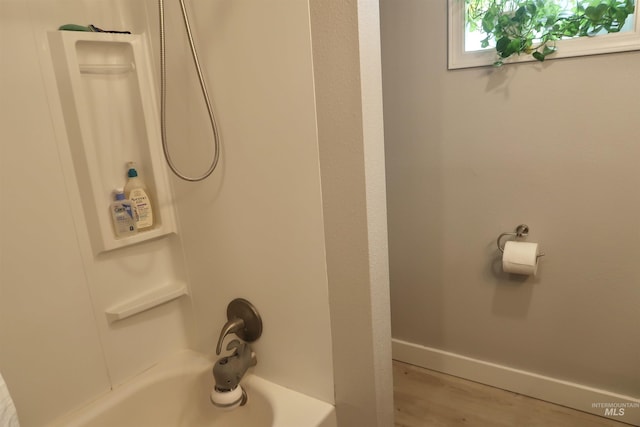 2405 23rd St, Clarkston, WA 99403 - bathroom with wood finished floors and bathing tub / shower combination