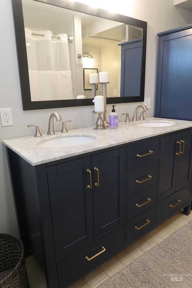 2405 23rd St, Clarkston, WA 99403 - full bath featuring double vanity and wood finished floors