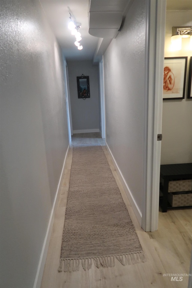 2405 23rd St, Clarkston, WA 99403 - corridor featuring wood finished floors and baseboards