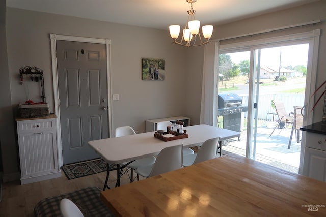 2405 23rd St, Clarkston, WA 99403 - dining room featuring a chandelier and light wood-style flooring