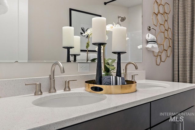 details featuring double vanity and a sink