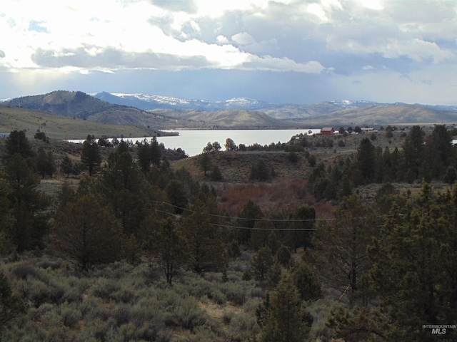 property view of mountains featuring a water view