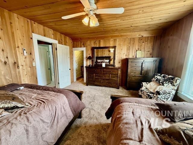407 1st St, Asotin, WA 99402 - bedroom featuring wood ceiling, wooden walls, and light colored carpet