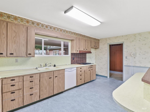 kitchen with dishwasher, gas stovetop, and sink