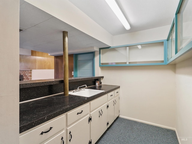 kitchen with white cabinets and sink