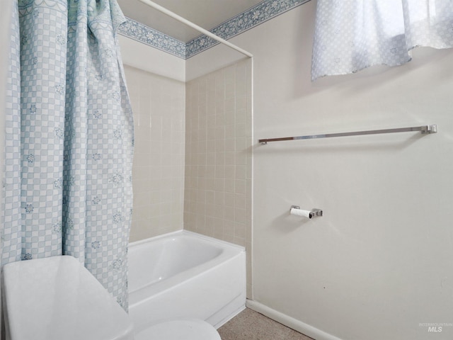 bathroom featuring tiled shower / bath combo