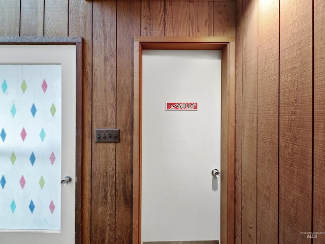 room details featuring wooden walls