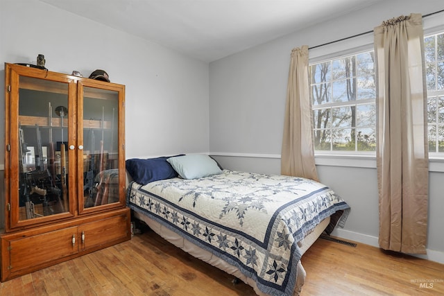 360 N 700 W, Paul, ID 83347 - bedroom featuring light wood-type flooring and baseboards