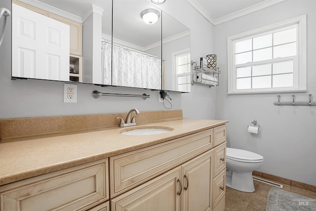 360 N 700 W, Paul, ID 83347 - bathroom with vanity, toilet, tile patterned floors, ornamental molding, and baseboards