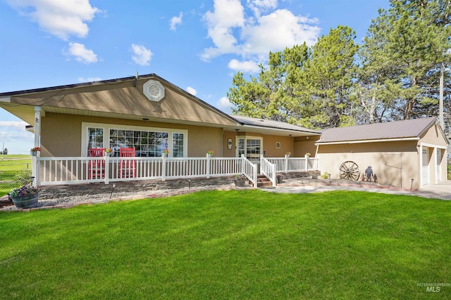 360 N 700 W, Paul, ID 83347 - rear view of property featuring a yard and stucco siding