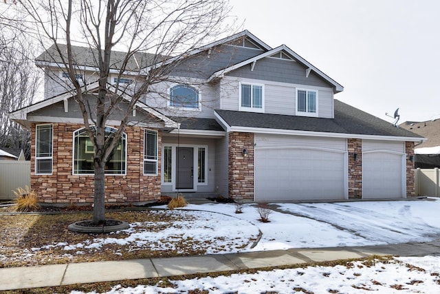 view of front of property with a garage