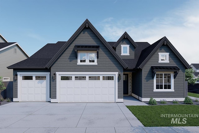 4265 W Thornapple Dr, Meridian, ID 83646 - view of front of home with driveway and a garage