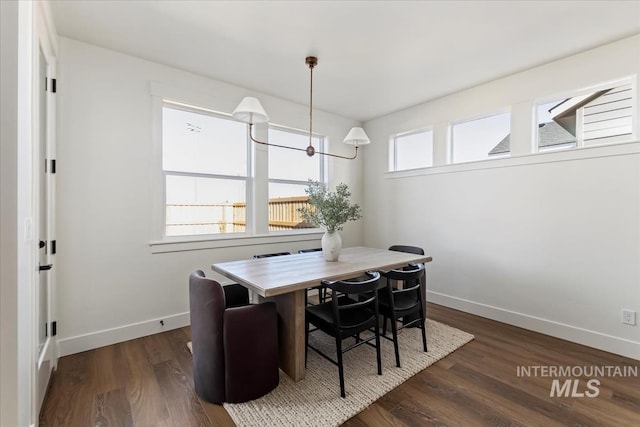 4265 W Thornapple Dr, Meridian, ID 83646 - dining room featuring dark wood-style floors and baseboards
