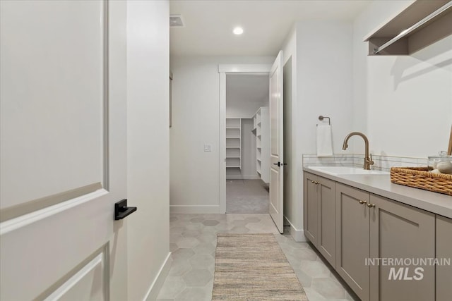 4265 W Thornapple Dr, Meridian, ID 83646 - full bathroom with vanity, recessed lighting, a spacious closet, and baseboards