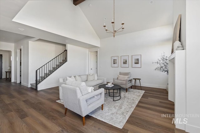 4265 W Thornapple Dr, Meridian, ID 83646 - living room with stairs, baseboards, dark wood-style floors, high vaulted ceiling, and a chandelier