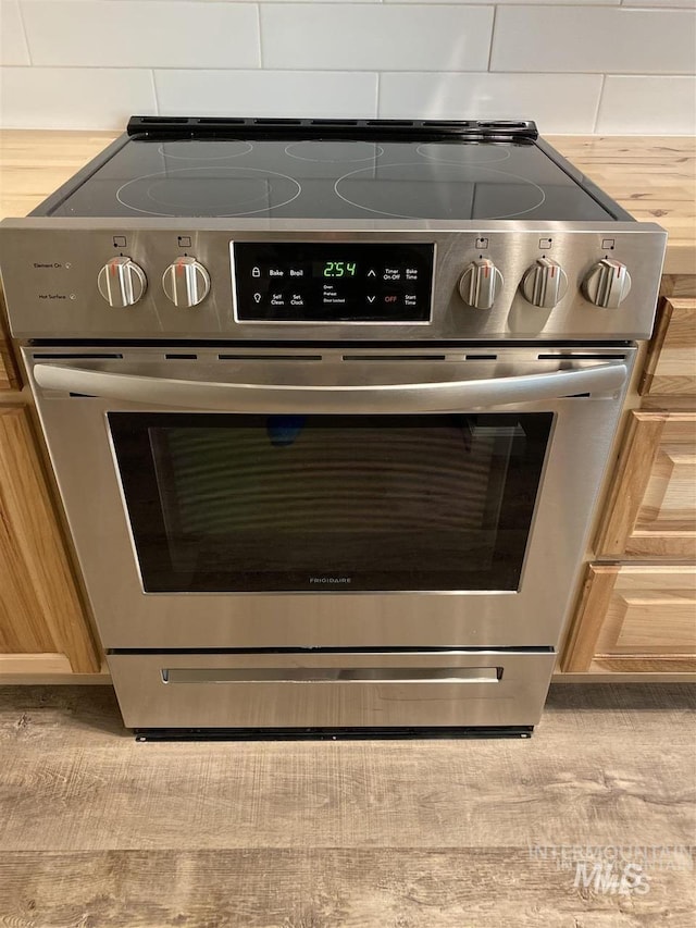 room details with stainless steel electric range