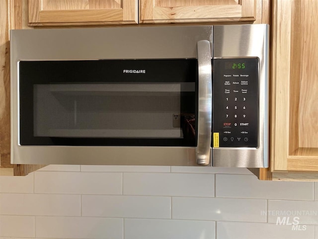 room details featuring stainless steel microwave