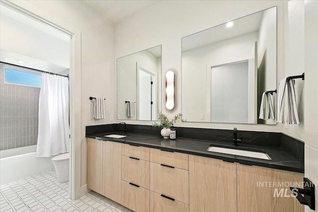 full bathroom with tile patterned floors, vanity, toilet, and shower / bath combo