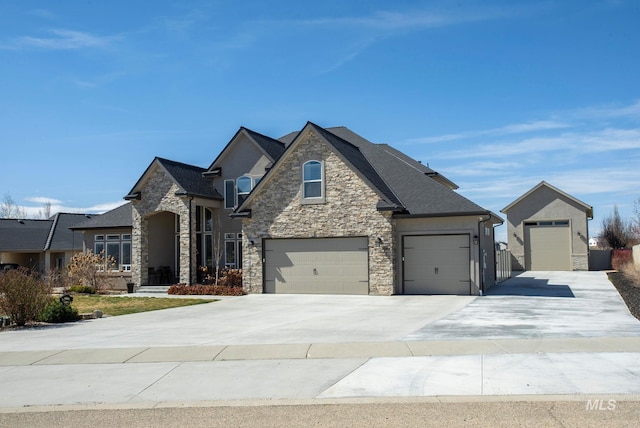 7063 S Pear Blossom, Meridian, ID 83642 - french country inspired facade with an attached garage, driveway, stone siding, and stucco siding