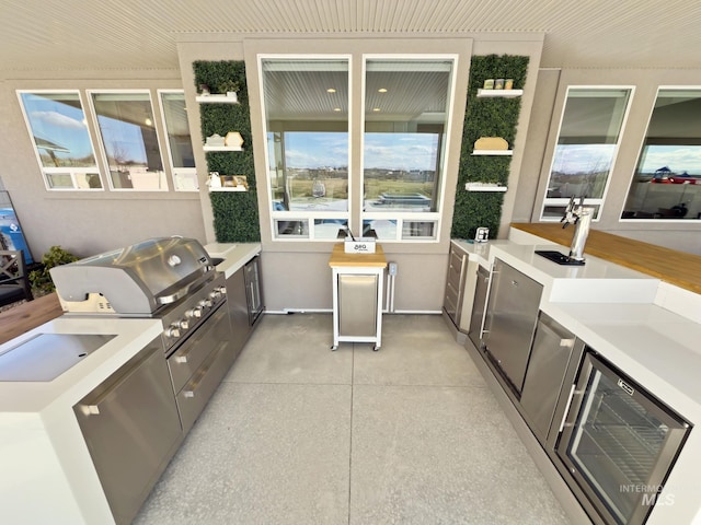 7063 S Pear Blossom, Meridian, ID 83642 - interior space with exterior kitchen and area for grilling