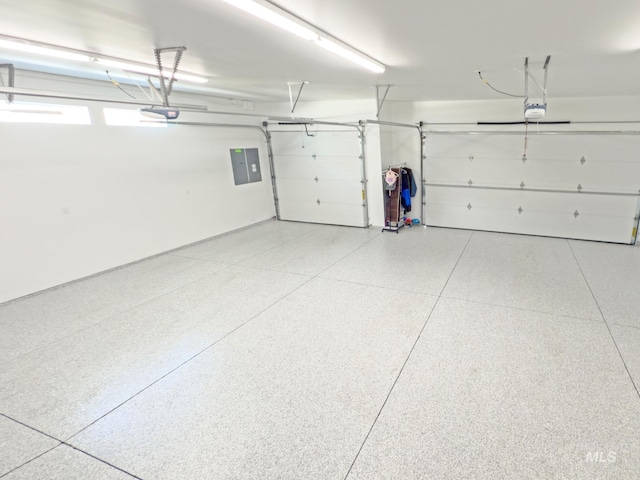 7063 S Pear Blossom, Meridian, ID 83642 - garage featuring a garage door opener and electric panel