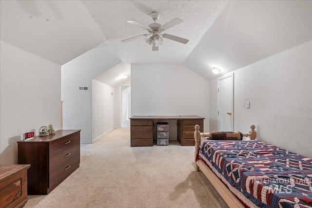 42 Hiatt Cir, Idaho City, ID 83631 - bedroom with light carpet, vaulted ceiling, ceiling fan, and a textured ceiling
