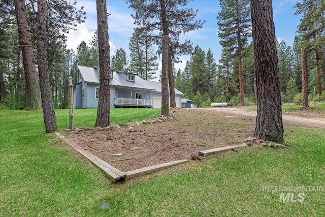 42 Hiatt Cir, Idaho City, ID 83631 - view of grassy yard with a garage and driveway