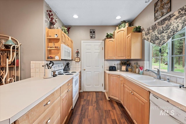 42 Hiatt Cir, Idaho City, ID 83631 - kitchen with white appliances, a sink, light brown cabinetry, dark wood-style flooring, and light countertops