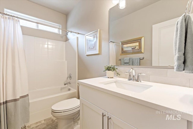 full bath with vanity, shower / bathtub combination with curtain, decorative backsplash, and toilet