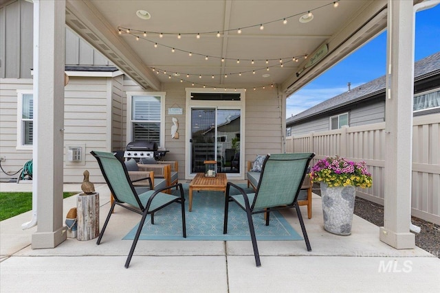 view of patio with fence