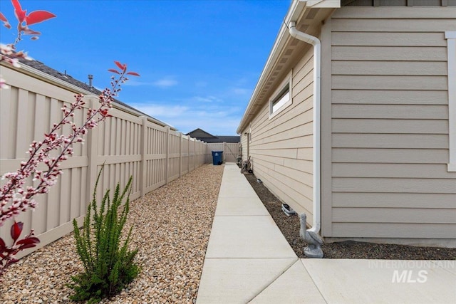 view of property exterior featuring a fenced backyard