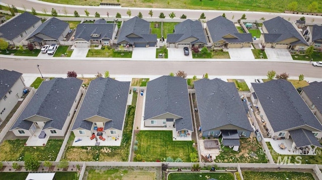 drone / aerial view with a residential view