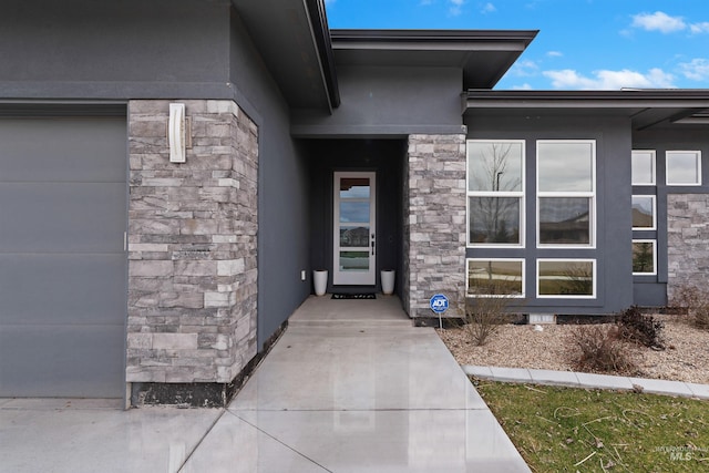 property entrance featuring a garage