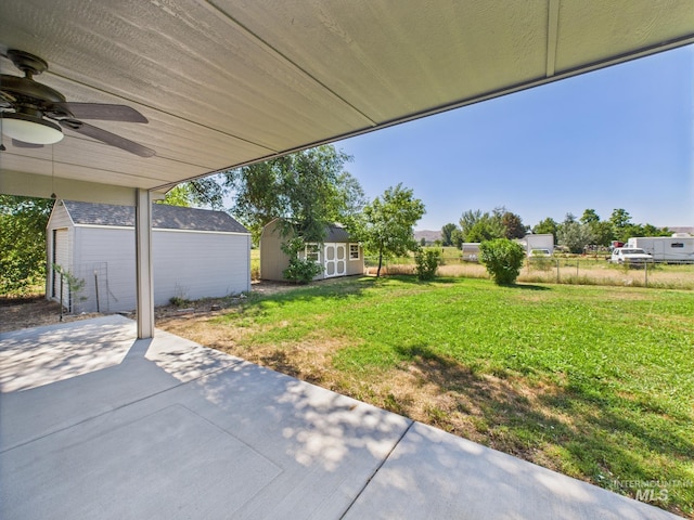 1673 Thomas, Emmett, ID 83617 - view of patio featuring a storage unit and a ceiling fan