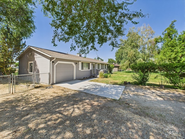1673 Thomas, Emmett, ID 83617 - ranch-style house with a gate, a garage, and driveway