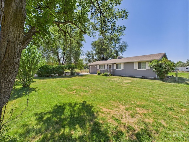 1673 Thomas, Emmett, ID 83617 - view of yard featuring an attached garage