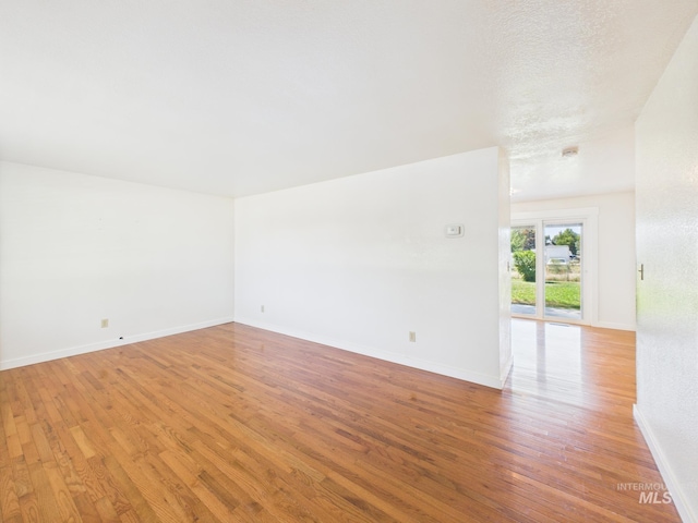 1673 Thomas, Emmett, ID 83617 - spare room with light wood finished floors