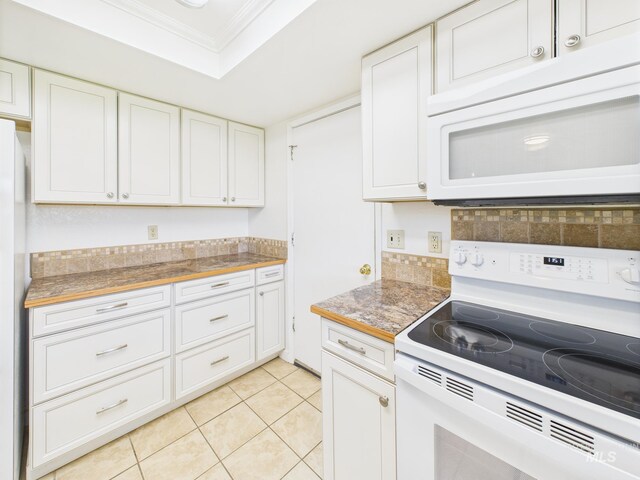 1673 Thomas, Emmett, ID 83617 - kitchen with white appliances, crown molding, white cabinetry, backsplash, and light tile patterned floors