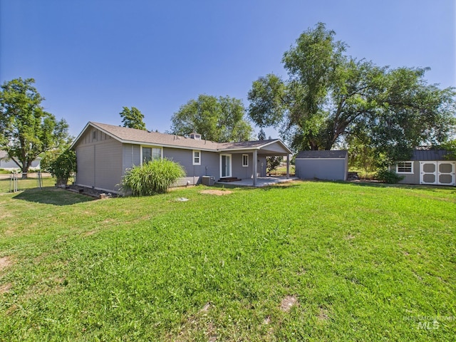 1673 Thomas, Emmett, ID 83617 - back of house featuring a storage shed and a patio area