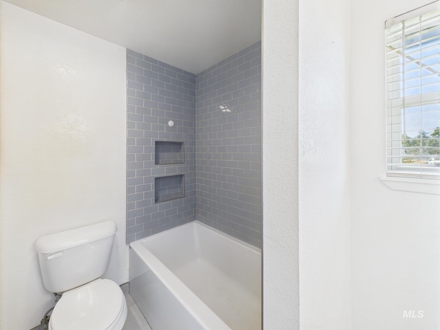 1673 Thomas, Emmett, ID 83617 - bathroom featuring toilet and bathing tub / shower combination
