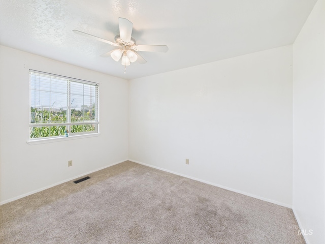 1673 Thomas, Emmett, ID 83617 - carpeted empty room featuring baseboards and ceiling fan