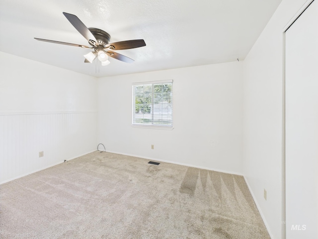 1673 Thomas, Emmett, ID 83617 - unfurnished room with carpet flooring and a ceiling fan