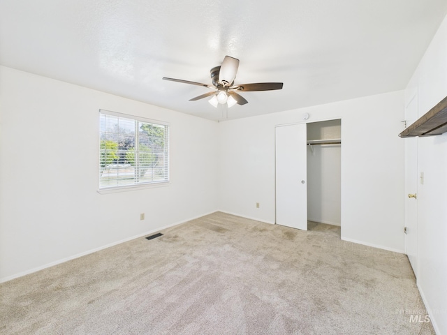 1673 Thomas, Emmett, ID 83617 - unfurnished bedroom featuring light colored carpet, a closet, and ceiling fan