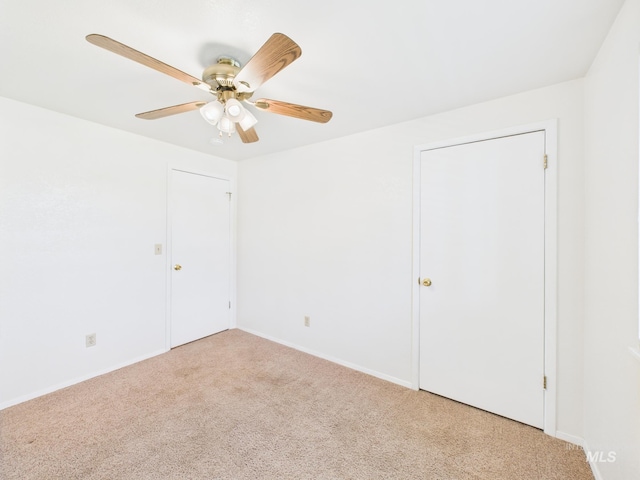 1673 Thomas, Emmett, ID 83617 - unfurnished bedroom featuring carpet and a ceiling fan