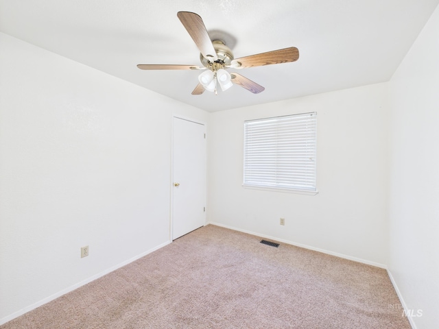1673 Thomas, Emmett, ID 83617 - spare room with light colored carpet and a ceiling fan
