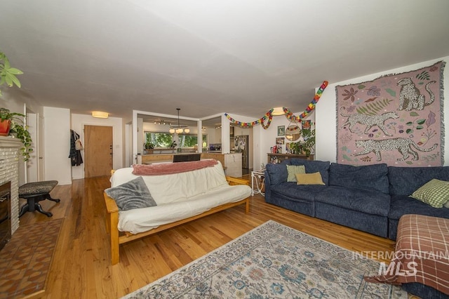 2844 Parke Circle Dr, Boise, ID 83705 - living area with wood finished floors and a fireplace