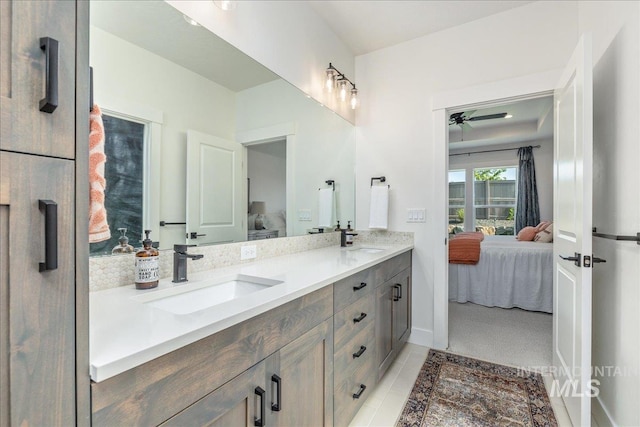 11328 W Campanula Dr, Star, ID 83669 - full bath featuring ensuite bath, double vanity, a ceiling fan, and tile patterned floors