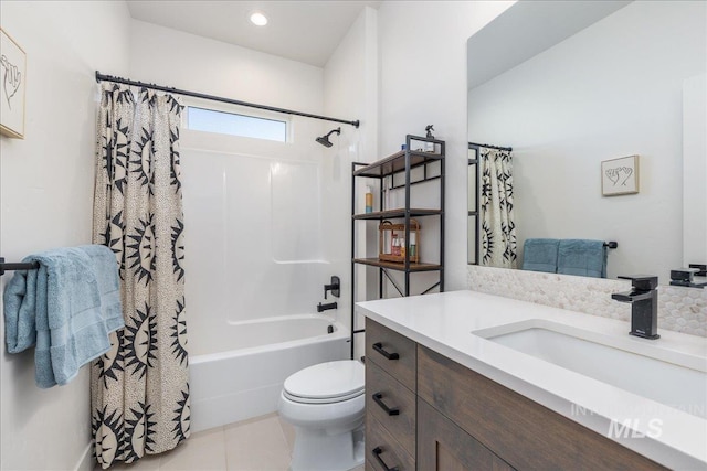 11328 W Campanula Dr, Star, ID 83669 - bathroom featuring vanity, shower / bathtub combination with curtain, toilet, and tile patterned flooring