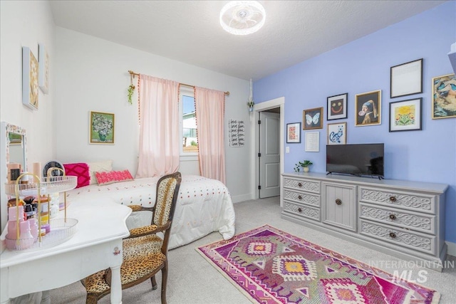 11328 W Campanula Dr, Star, ID 83669 - bedroom with light colored carpet and baseboards